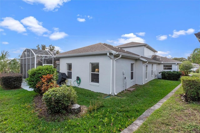 view of property exterior featuring a lanai and a yard