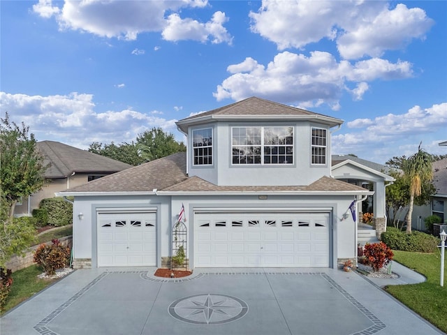 front of property with a garage