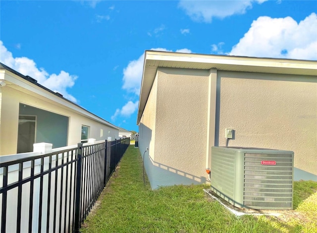 view of home's exterior featuring central AC