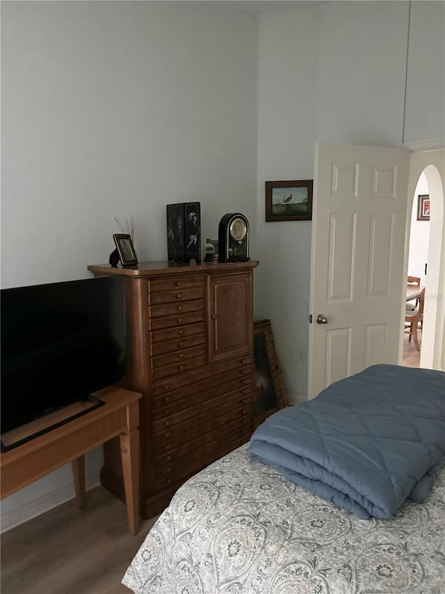 bedroom featuring hardwood / wood-style floors