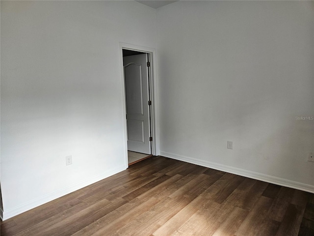652 Chelsea Dr, Davenport, FL 33897 - empty room featuring wood finished floors and baseboards