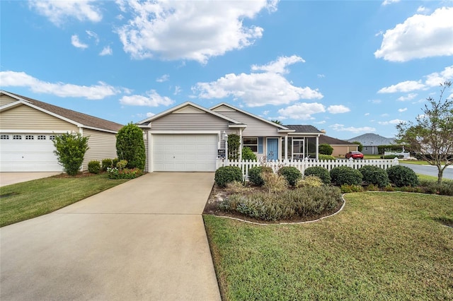 ranch-style home featuring a garage and a front lawn