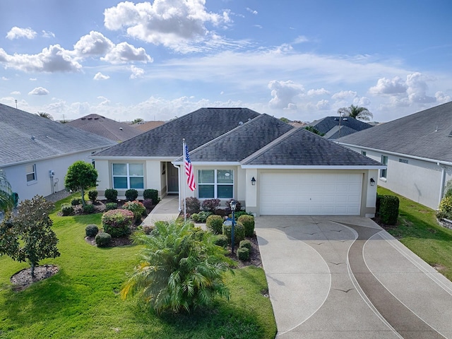 ranch-style house with a garage and a front yard