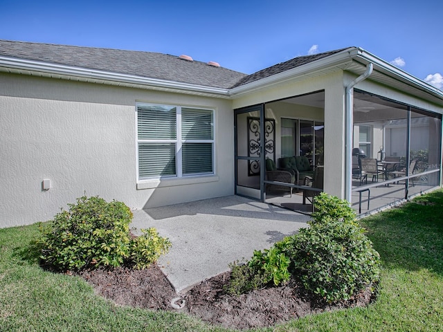 doorway to property with a patio area