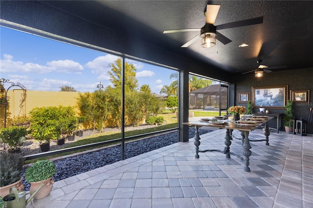 sunroom with vaulted ceiling