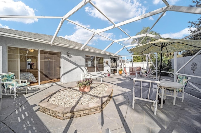 view of patio with a lanai