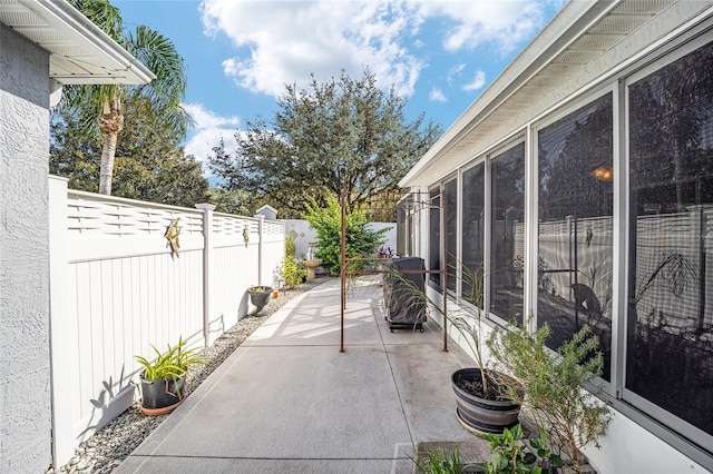 view of patio / terrace with a sunroom