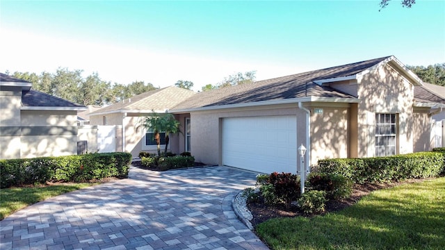 single story home with a garage