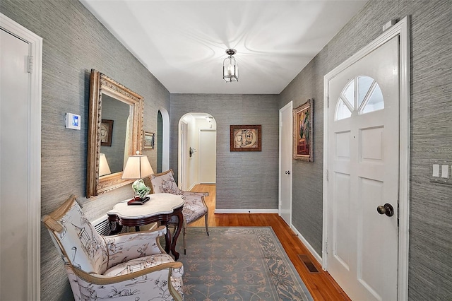 entrance foyer with hardwood / wood-style floors