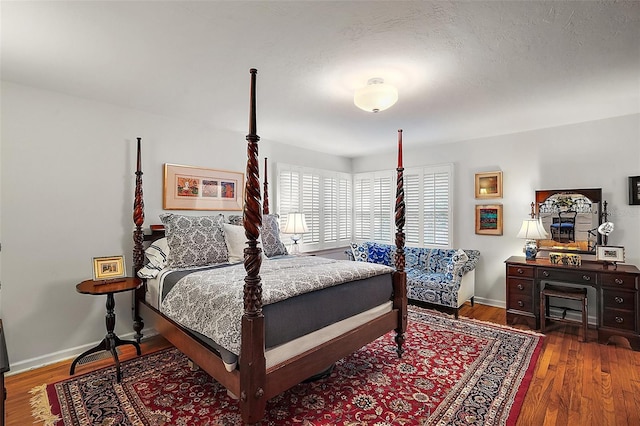 bedroom featuring dark hardwood / wood-style floors