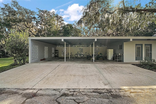 view of parking featuring a carport