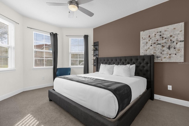 bedroom featuring ceiling fan and carpet floors