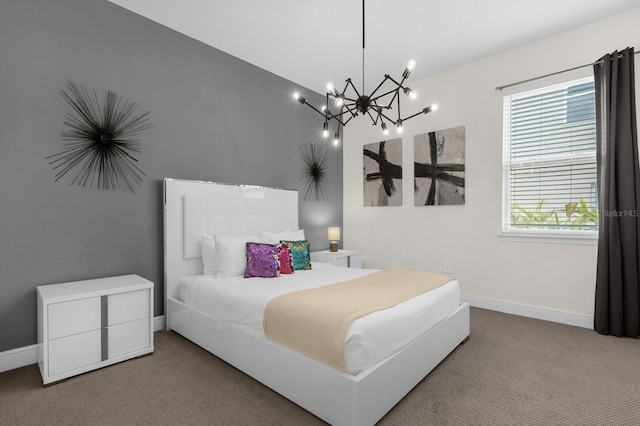 carpeted bedroom featuring a notable chandelier