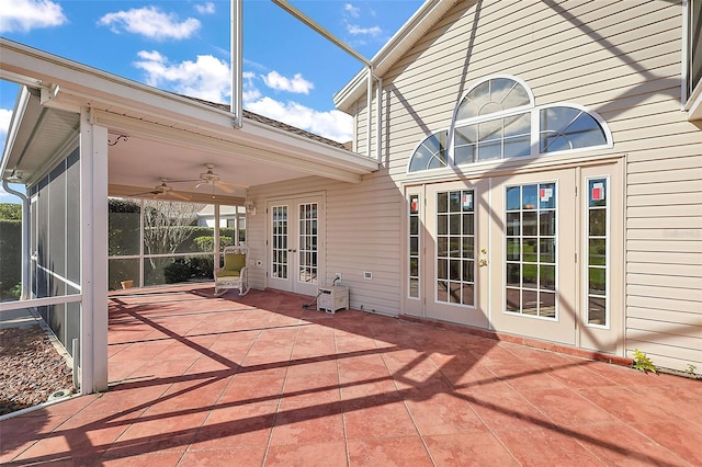 view of patio / terrace featuring ceiling fan and french doors