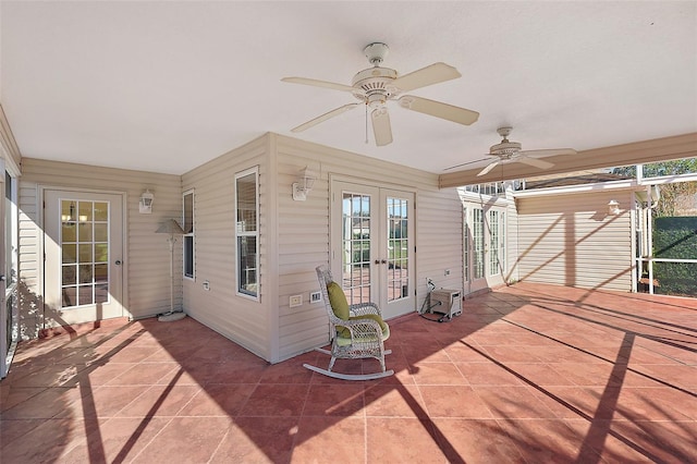 view of patio featuring french doors and ceiling fan