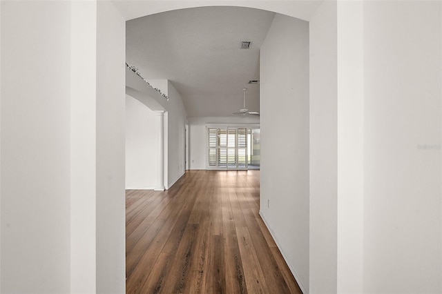 hall with hardwood / wood-style floors