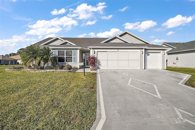 single story home featuring a front yard and a garage