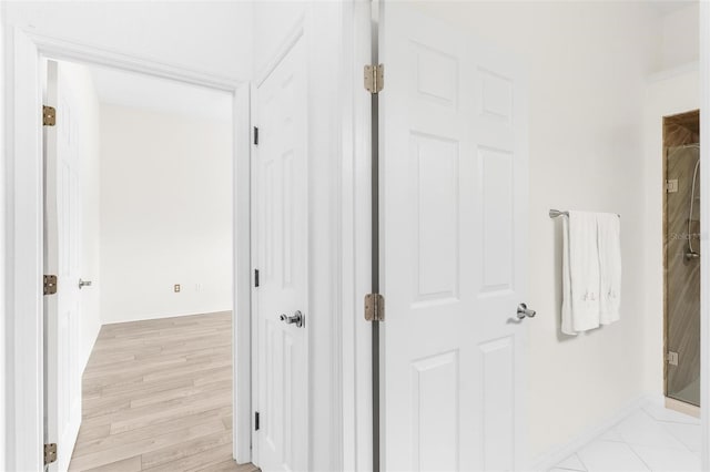 hall featuring light hardwood / wood-style flooring