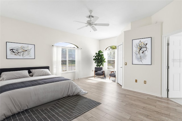 bedroom featuring ceiling fan and light hardwood / wood-style flooring