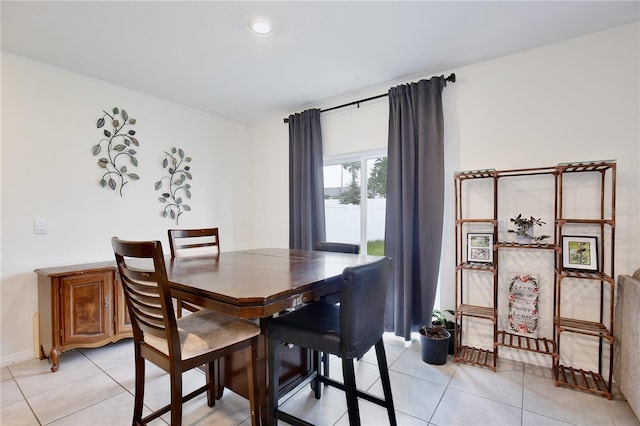 view of tiled dining area