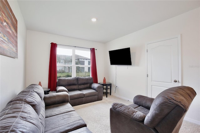 living room featuring light carpet