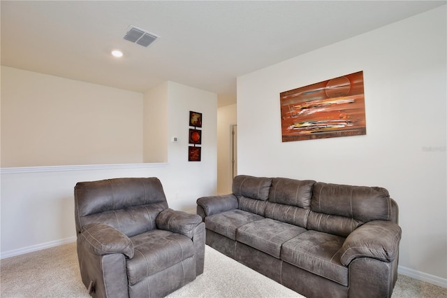 living room with light colored carpet