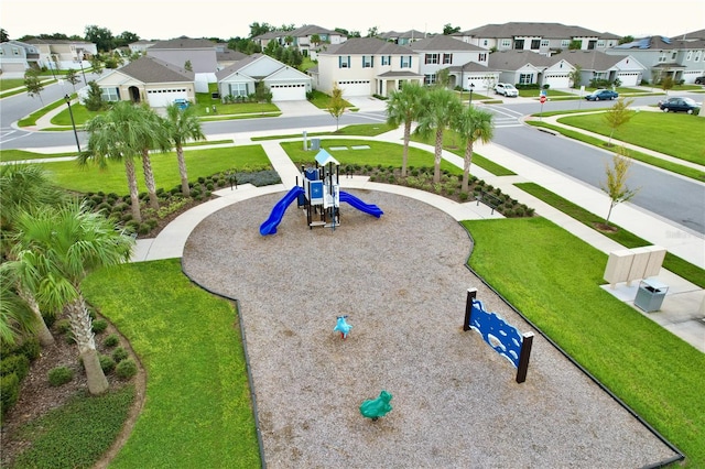 view of property's community featuring a playground