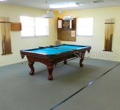 rec room with concrete flooring and billiards