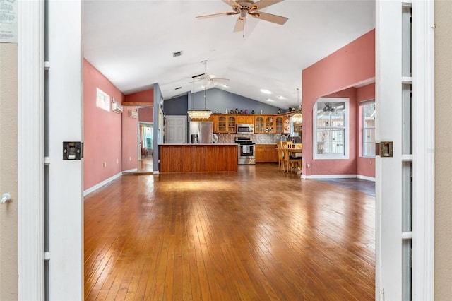 living room with dark hardwood / wood-style floors, ceiling fan, and lofted ceiling