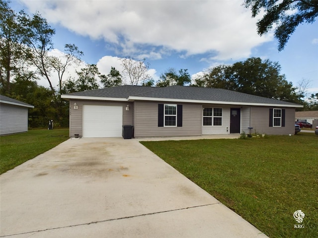 ranch-style house with a garage and a front yard