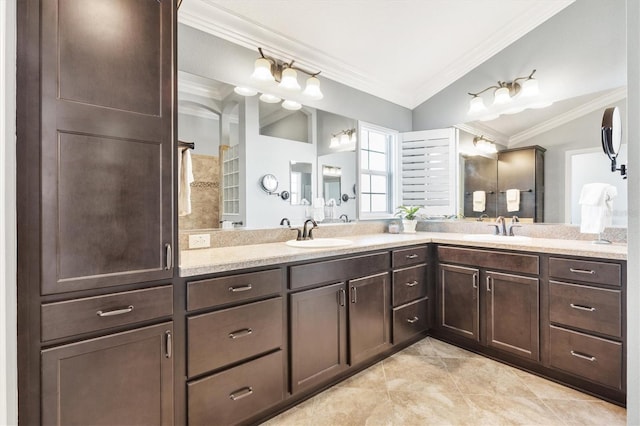 bathroom featuring vanity and ornamental molding