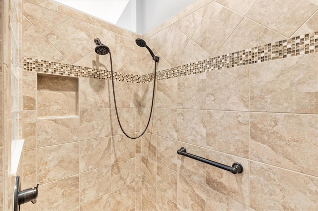 room details with a tile shower