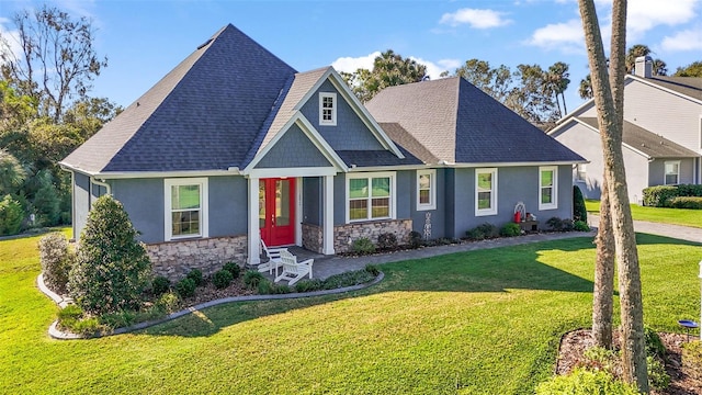 craftsman house with a front yard