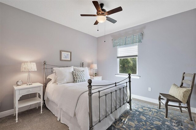 bedroom with carpet flooring and ceiling fan