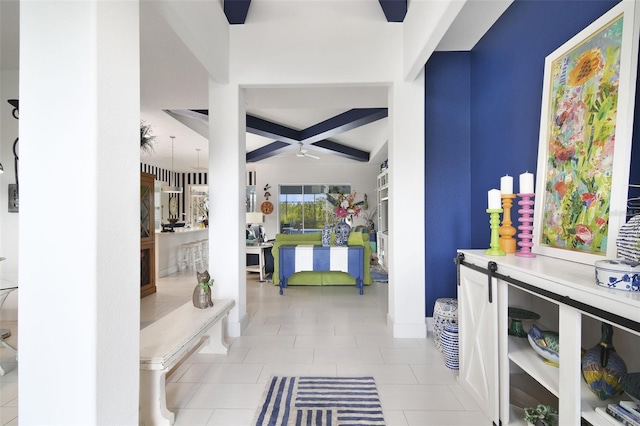 hall with beamed ceiling, light tile patterned floors, and coffered ceiling