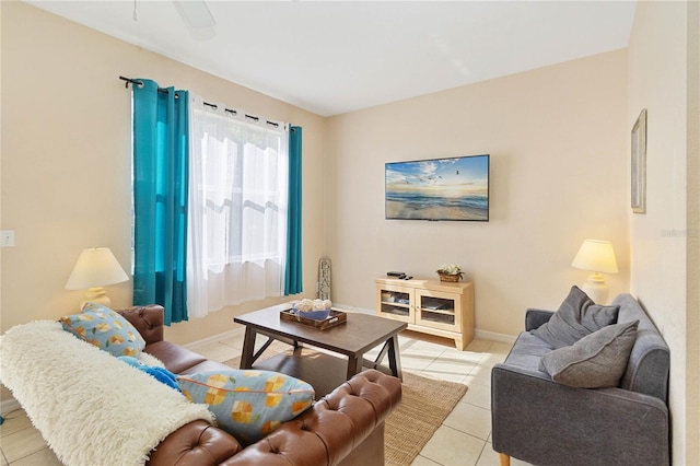 tiled living room featuring ceiling fan