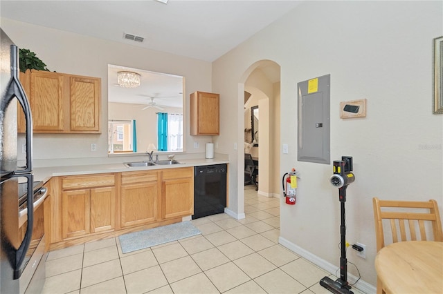 kitchen featuring light tile patterned floors, sink, electric panel, and black appliances