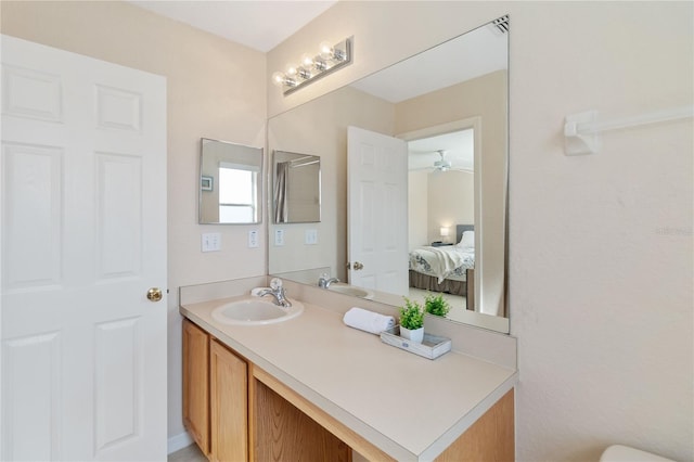 bathroom featuring vanity and ceiling fan