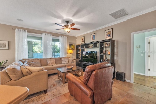 living room featuring a textured ceiling, ceiling fan, and crown molding