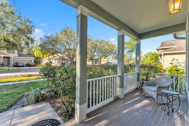 wooden terrace featuring a porch