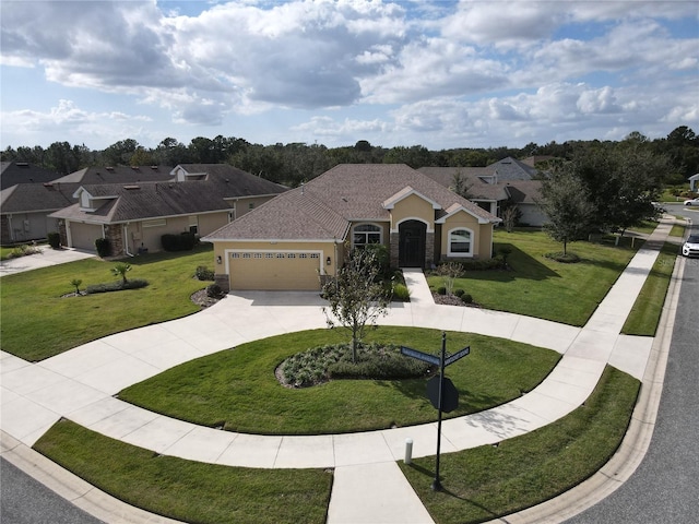 view of front facade with a front lawn and a garage