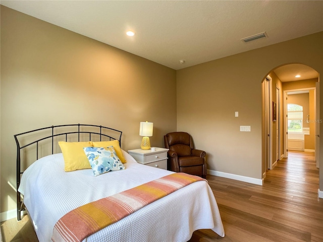 bedroom featuring light wood-type flooring