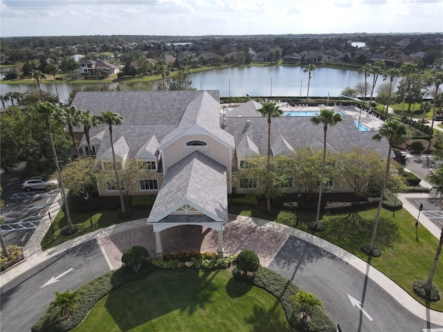 birds eye view of property featuring a water view