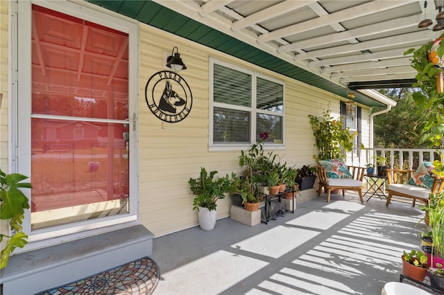 view of patio featuring covered porch