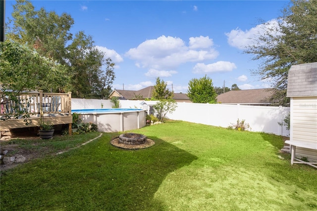 view of yard featuring a pool side deck