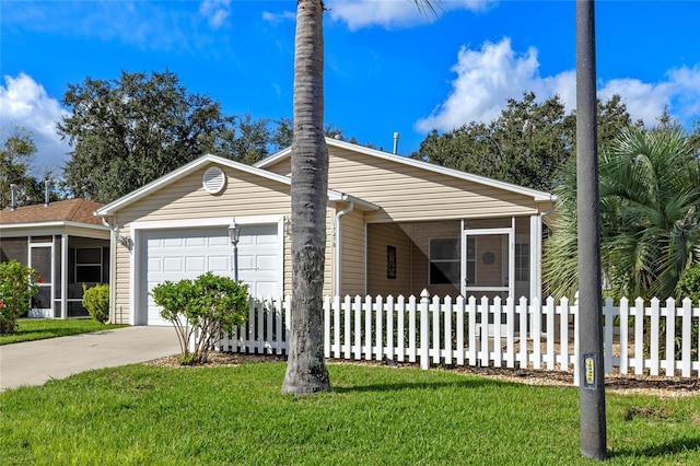 ranch-style home with a front yard, a garage, and a sunroom