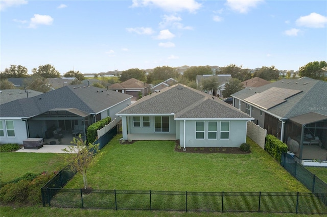 view of front of property with a patio area and a front yard