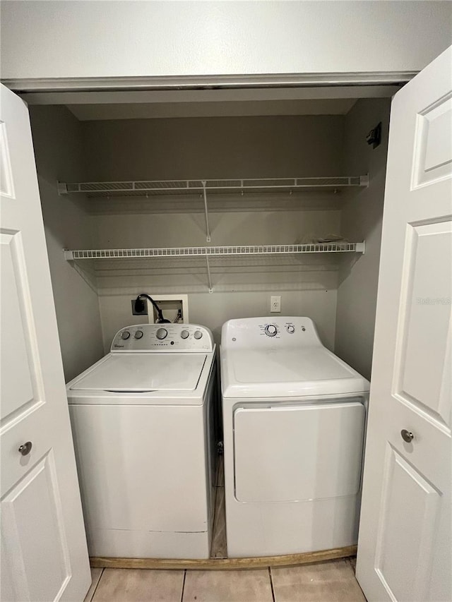 laundry area with washer and dryer