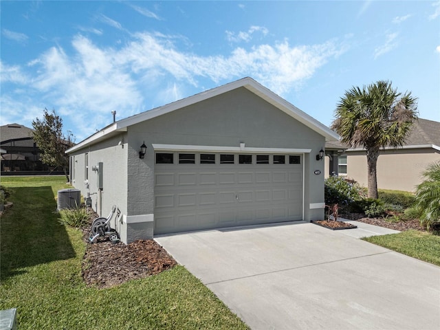 view of front of house featuring a garage and a front lawn