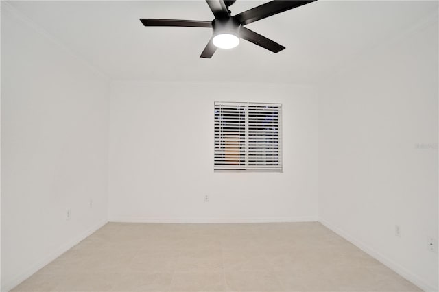 unfurnished room with ceiling fan and ornamental molding